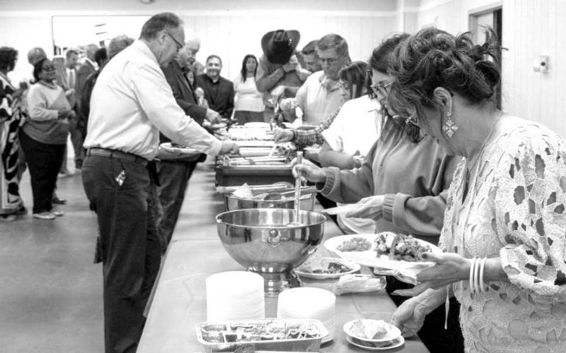 Attendees of the Littlefield Chamber of Commerce and Agriculture enjoy catering from Loco’s Restaurant on Feb. 26, 2026. (Photo by Madison Vidales)