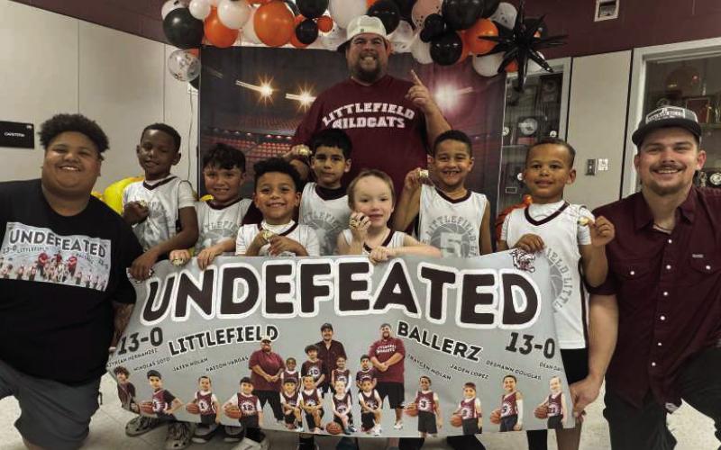 The Littlefield Wildcats 1st and 2nd Grade Boys team coached by Derek Lopez, Mariah Weaver and Austin Tyler won the Championship game on Sunday to cap off their season. (Shown L-R): Coach Mariah Weaver, Traycen Nolan, Kaeson Vargas, Jaden Lopez, Niko Soto, Coach Derek Lopez, Dean Davis, DeShawn Douglas, Jaxen Nolan, Azuriah Hernandez and Coach Austin Tyler. (Submitted Photo)