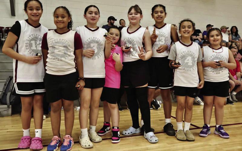 The Littlefield Lady Cats 3rd and 4th Grade Girl’s team coached by JG Garza and Tyler Lundberg won the Championship game on Sunday to cap off their season. (Shown): Felicity Gonzales, Abbigayle Long, Jayda Jaramillo, Gianna Garza, Elle Moreno, Kinsley Lundberg, Nalani Martinez, Nicole Sargent and Victoria Santillan. (Submitted Photo)