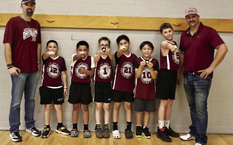 The Littlefield Wildcats 3rd and 4th Grade Boys team coached by Nathan McKinnon and Matthew Bussanmas won the Championship game on Sunday to cap off their season. (Shown): Coach Nathan McKinnon, Abriel Sanchez, Travis McKinnon, Jordan Sanchez, Ryan Martinez, Beau Bussanmas, Elliot Allen, Gage Gonzales, Mason Thurman and Coach Matthew Bussanmas. (Submitted Photo)